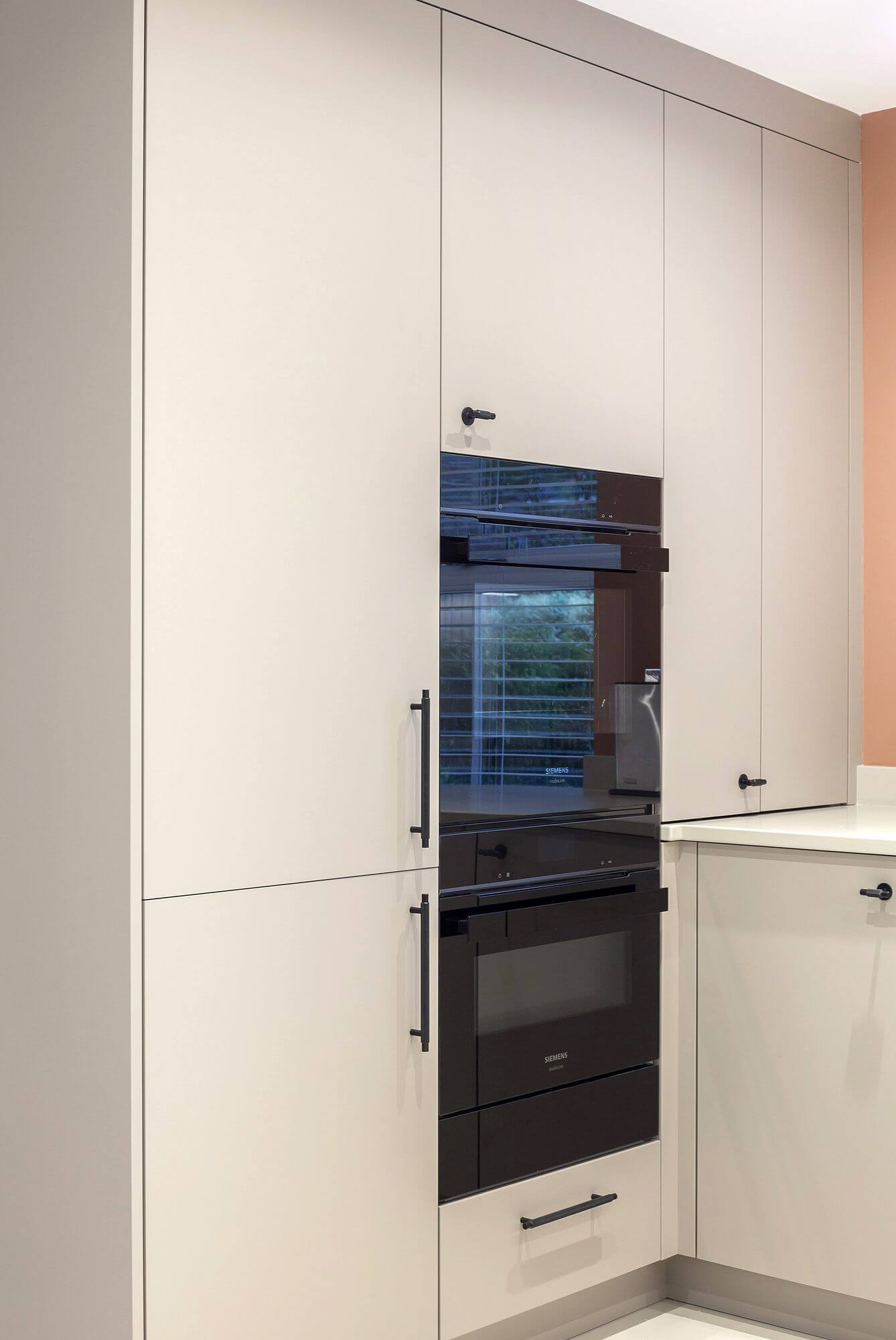 Integrated ovens in kitchen workspace