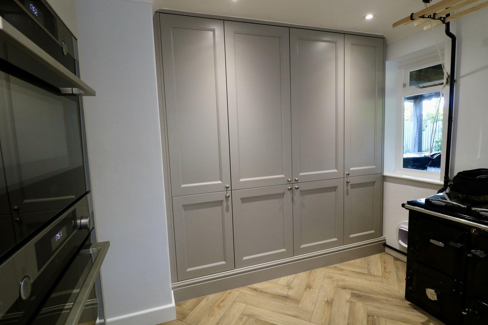 Full height kitchen cupboards