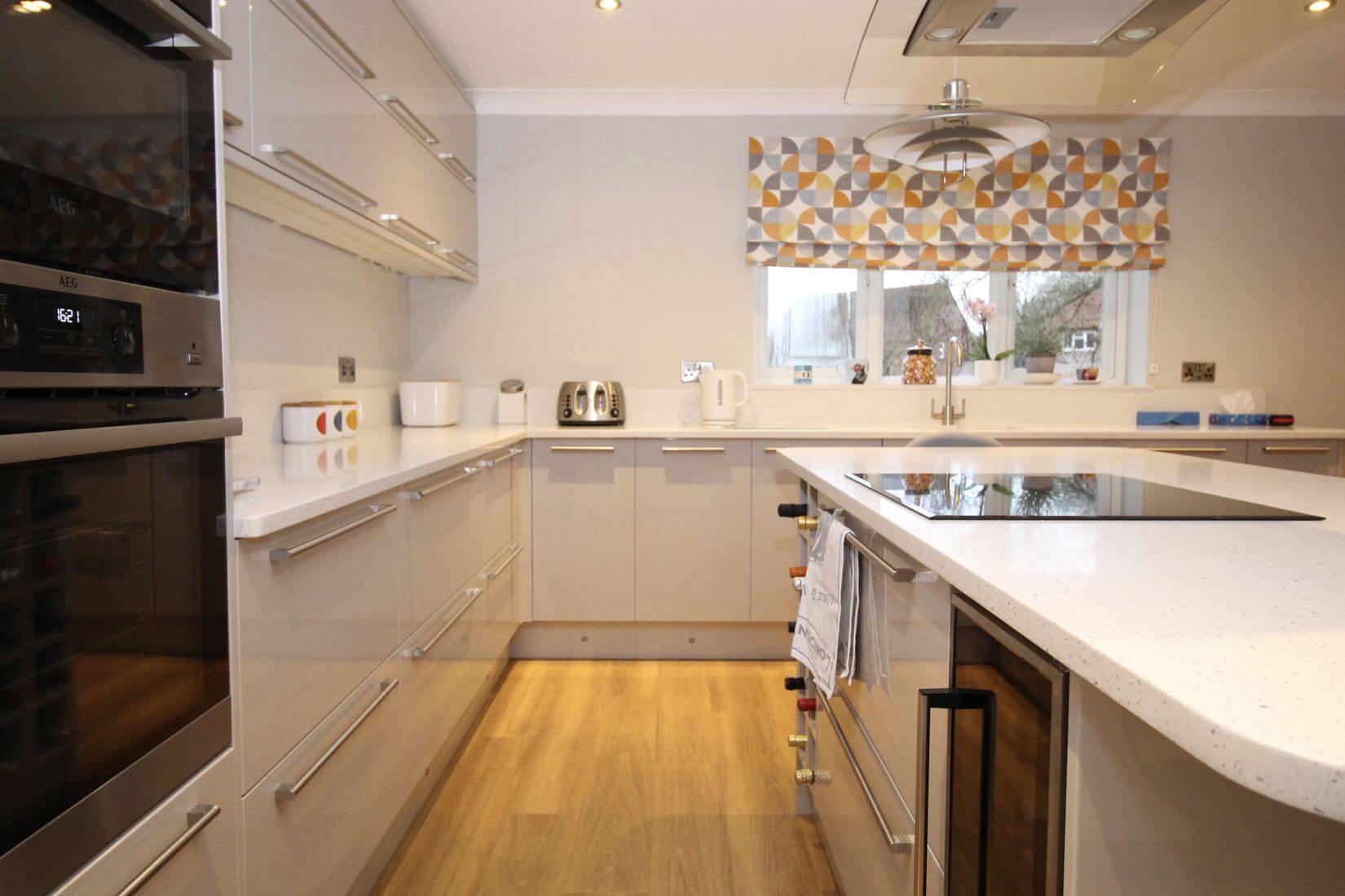 Modern kitchen renovation with gloss cupboards
